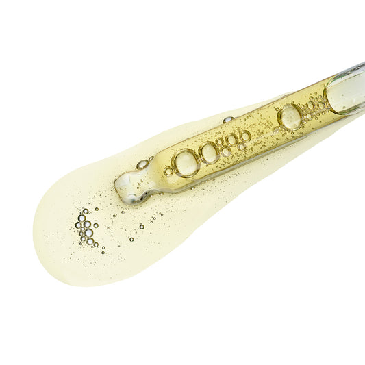 Close-up of the lightweight texture of the Purifying Extract, showcasing its hydrating and soothing properties.