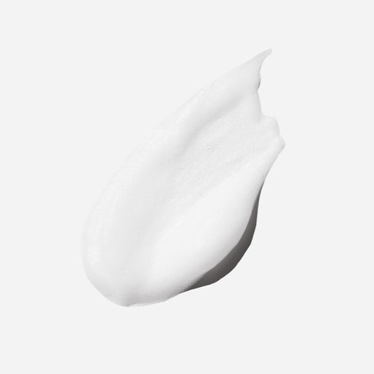 Close-up of the creamy texture of the Purifying Mask, highlighting its rich, revitalizing ingredients.