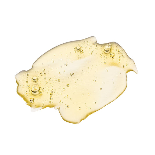 Close-up of the smooth, lightweight texture of the Radiance Oil, showcasing its nourishing formula for revitalized skin.