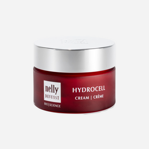 Jar of Hydrocell Cream with a smooth texture, surrounded by hydrating ingredients like hyaluronic acid and collagen, highlighting its moisturizing benefits for dehydrated skin.